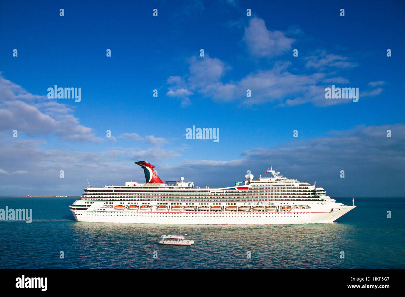 Aerial View of Cruise Ship Carnival Freedom with a tender beside it Stock Photo