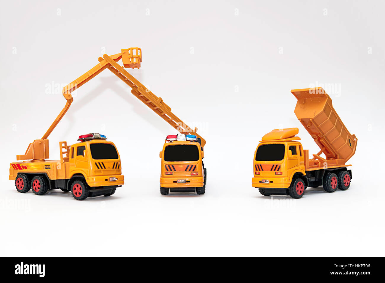 Set of orange construction toys on white background Stock Photo