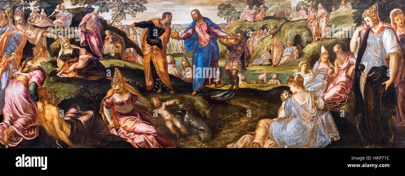 The Miracle of the Loaves and Fishes by Tintoretto, oil on canvas, c.1545-50. The painting depicts the feeding of the multitude. Stock Photo