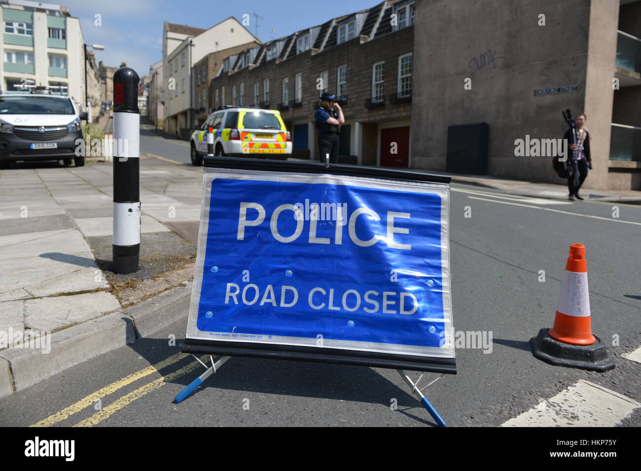 Bath, UK - May 13, 2016: A closed road sign sits at a roadblock in the vicinity of an unexploded WWII bomb found at a construction site. Stock Photo