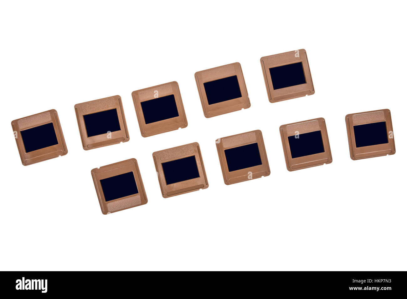 Vintage photo slides in a rows isolated on white background with