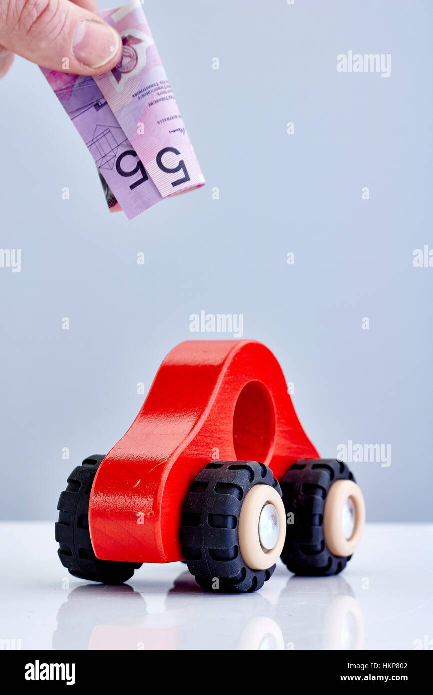 A conceptual studio photo of motor vehicle costs Stock Photo Alamy
