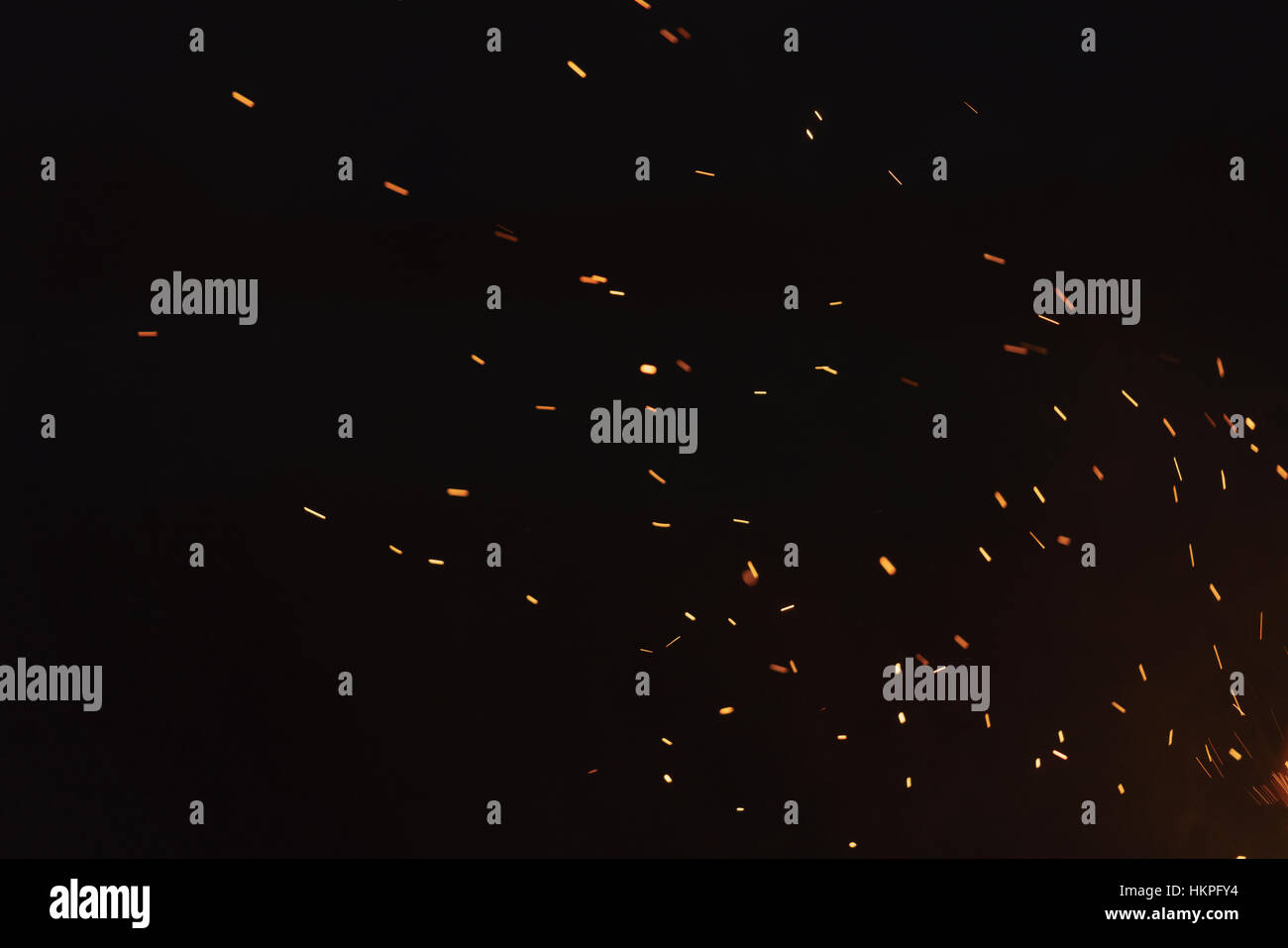 bonfire spark in the dark sky in night Stock Photo - Alamy