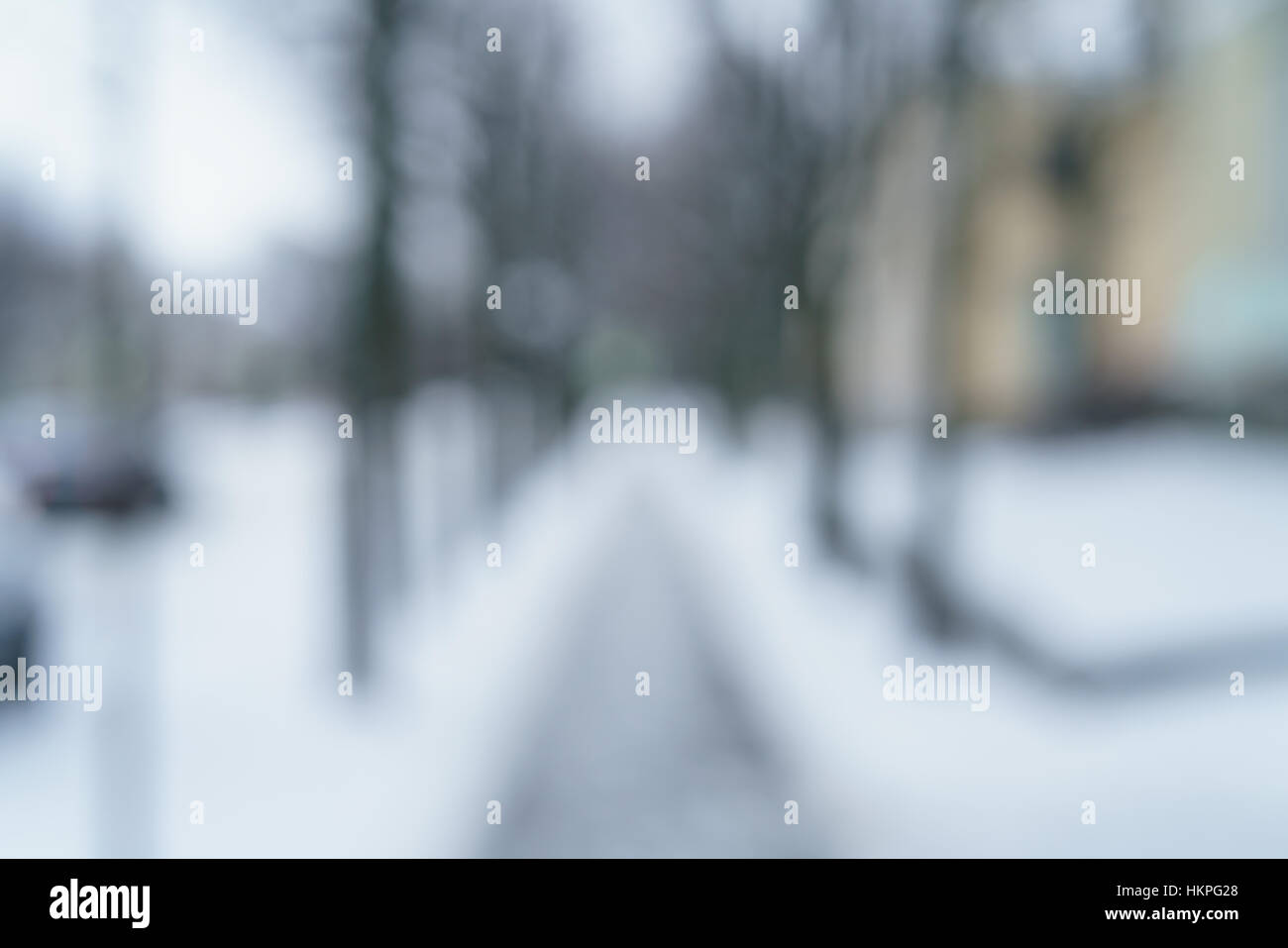 blurred background of town sidewalk in winter Stock Photo