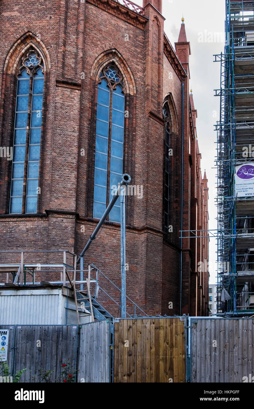 Berlin, Mitte. The beautiful Neo-gothic Friedrichswerder Church is closed as result of new building works around it. Poor city planning. Stock Photo