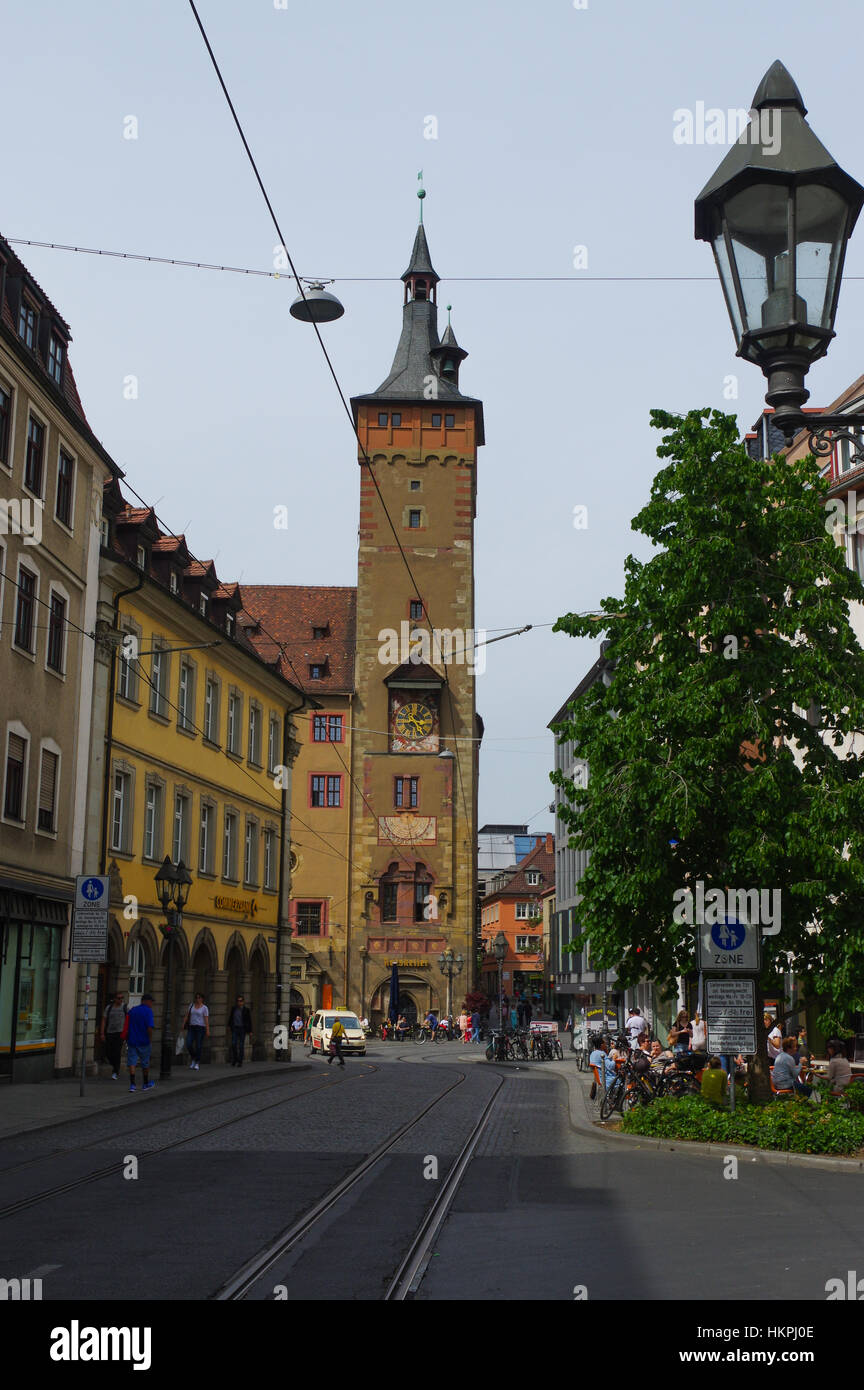 Wurzburg, Germany May 11, 2015 People cross the old Main Bridge