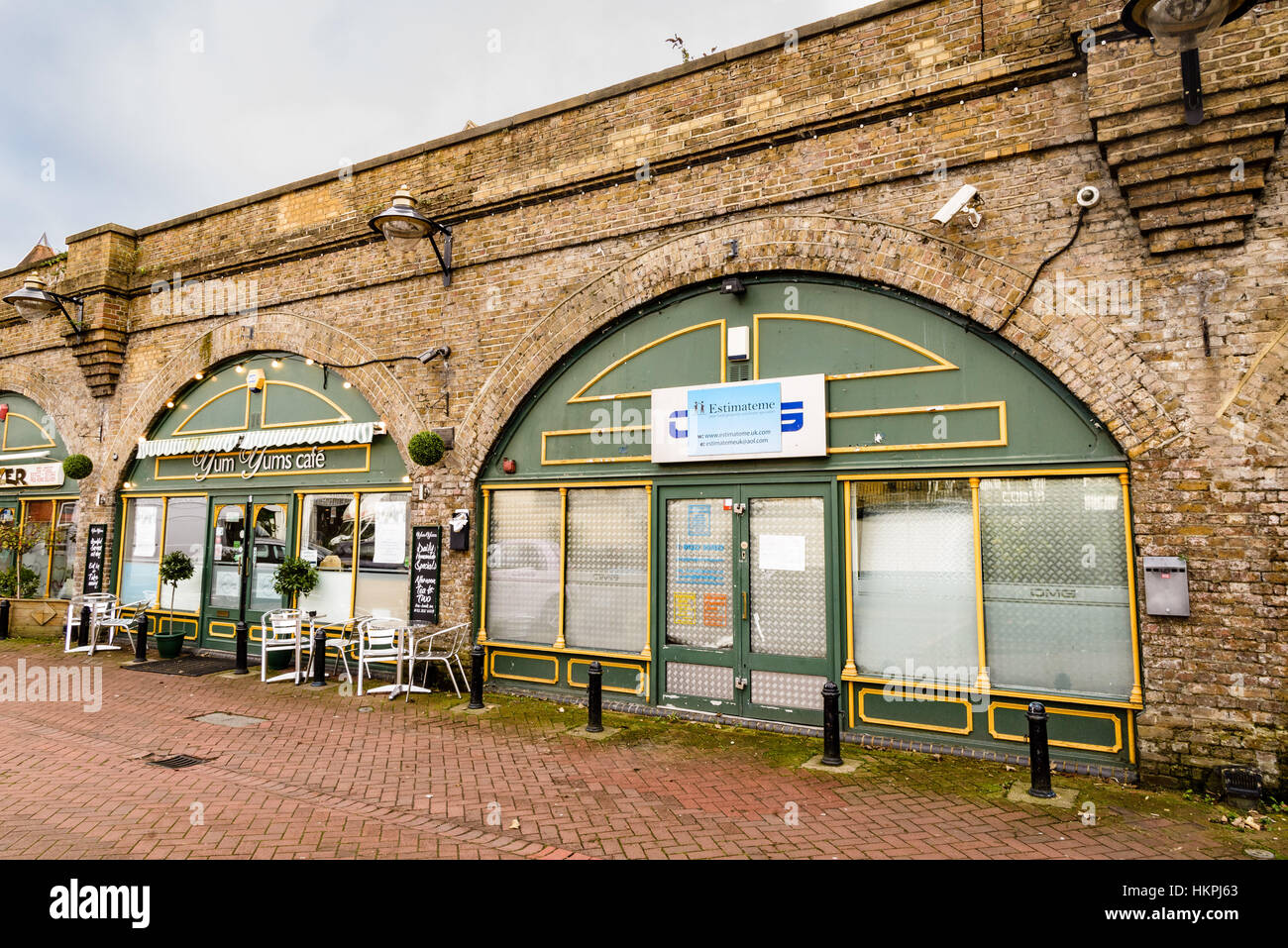 Shops and Cafes occupying space under railway arches, Mill Row, Bexley