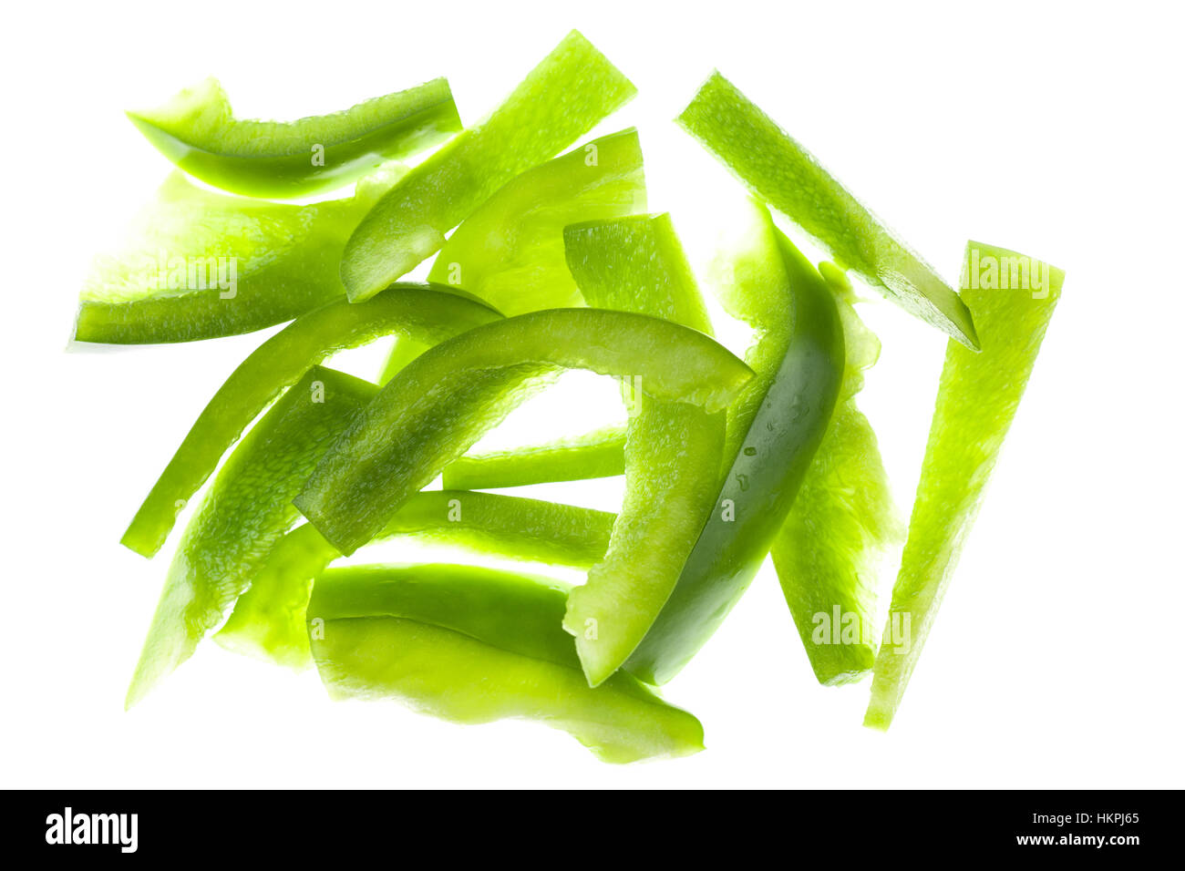 Sliced Green Pepper on white background Stock Photo - Alamy