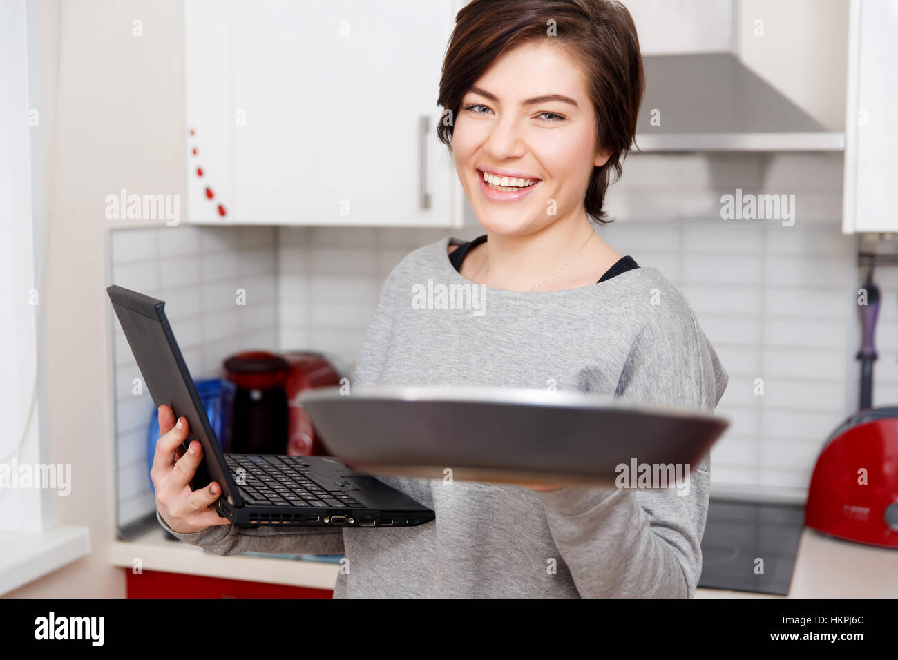 Beautiful young girl with laptop Stock Photo - Alamy