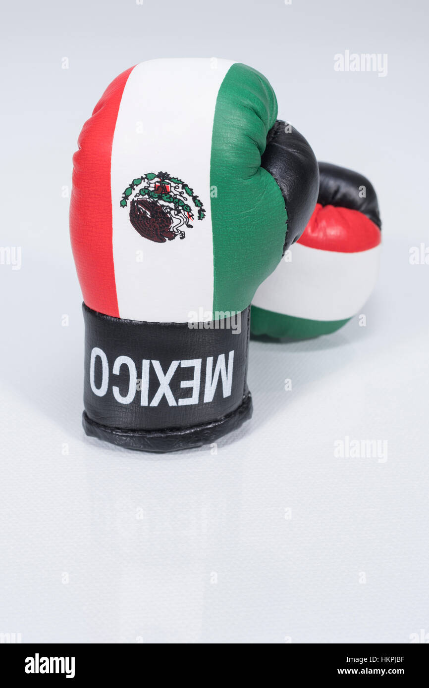 America-Mexico stand-off (Donald Trump) represented by Mexican boxing gloves. NAFTA breakdown concept. Stock Photo