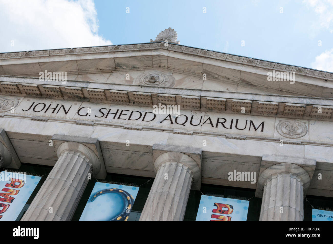 The front of the John G. Shedd Aquarium in Chicago is decorated with carvings of shells, fish & other marine animals. Stock Photo