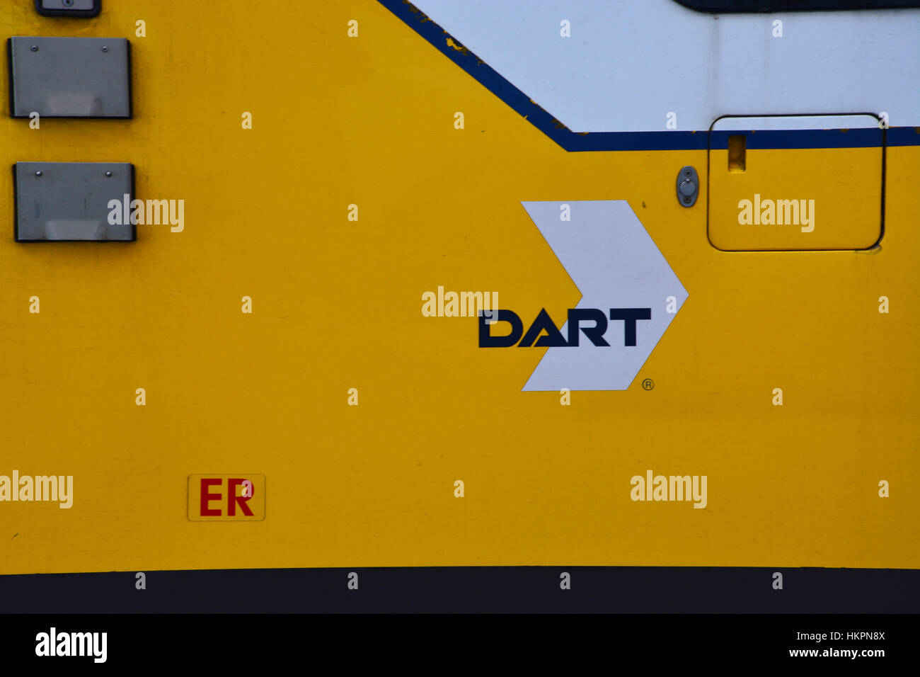 The Dallas Area Rapid Transit logo on the side of a train car. Stock Photo