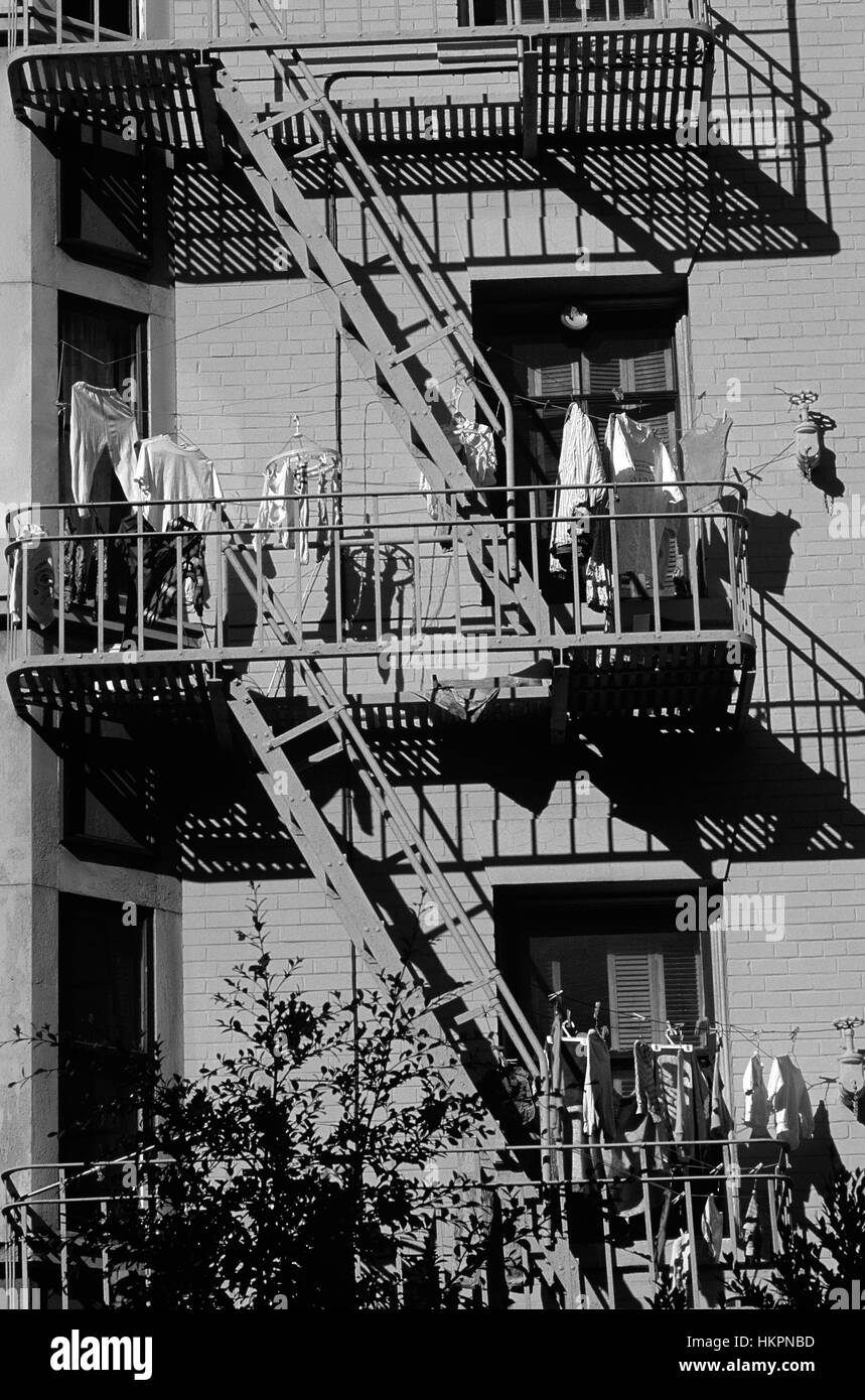 Retro image of San Francisco China town with laundry on clothes line hanging on outside fire escape California USA Stock Photo