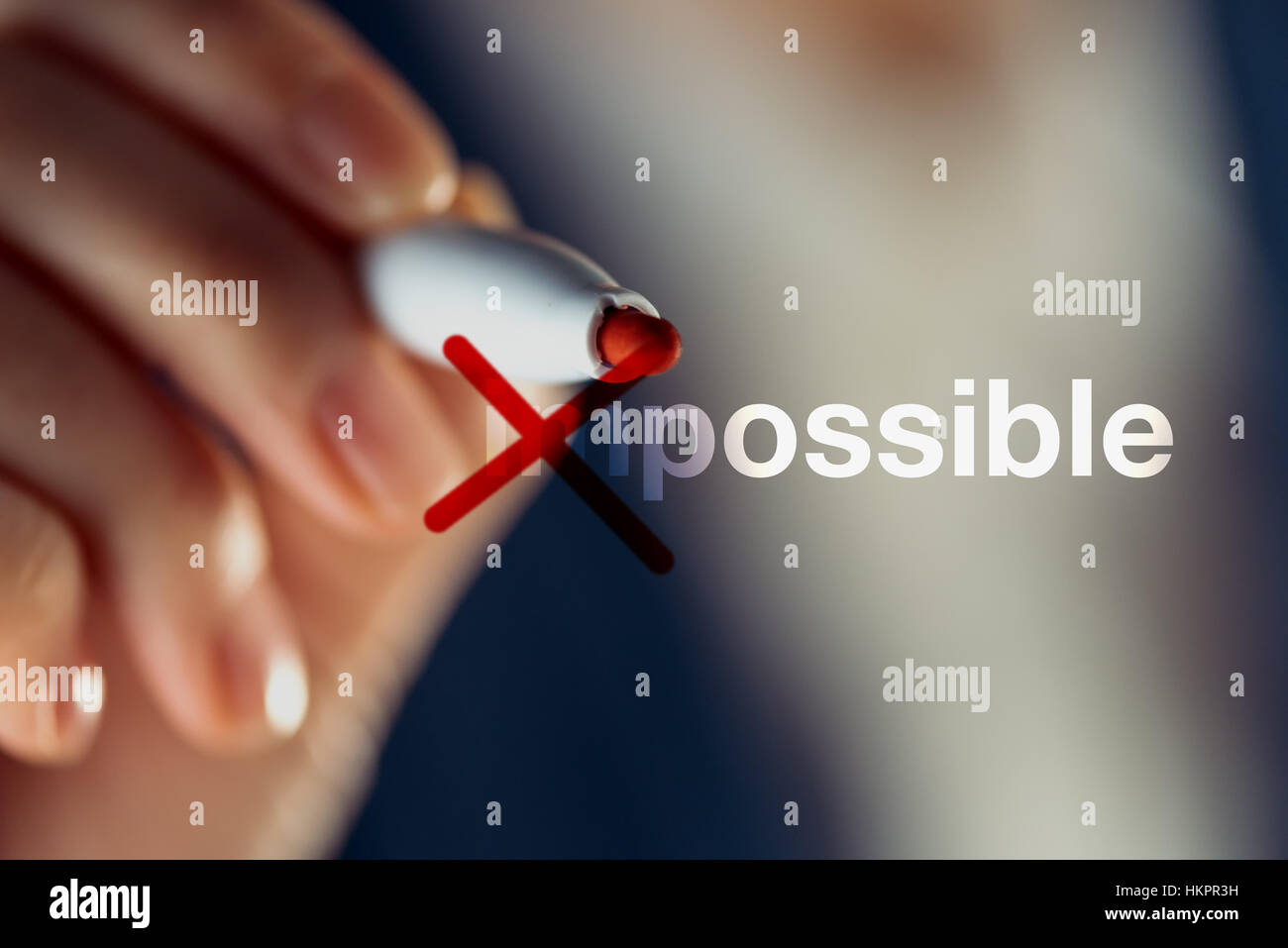 Making the impossible possible with red marker pen, business concept Stock Photo