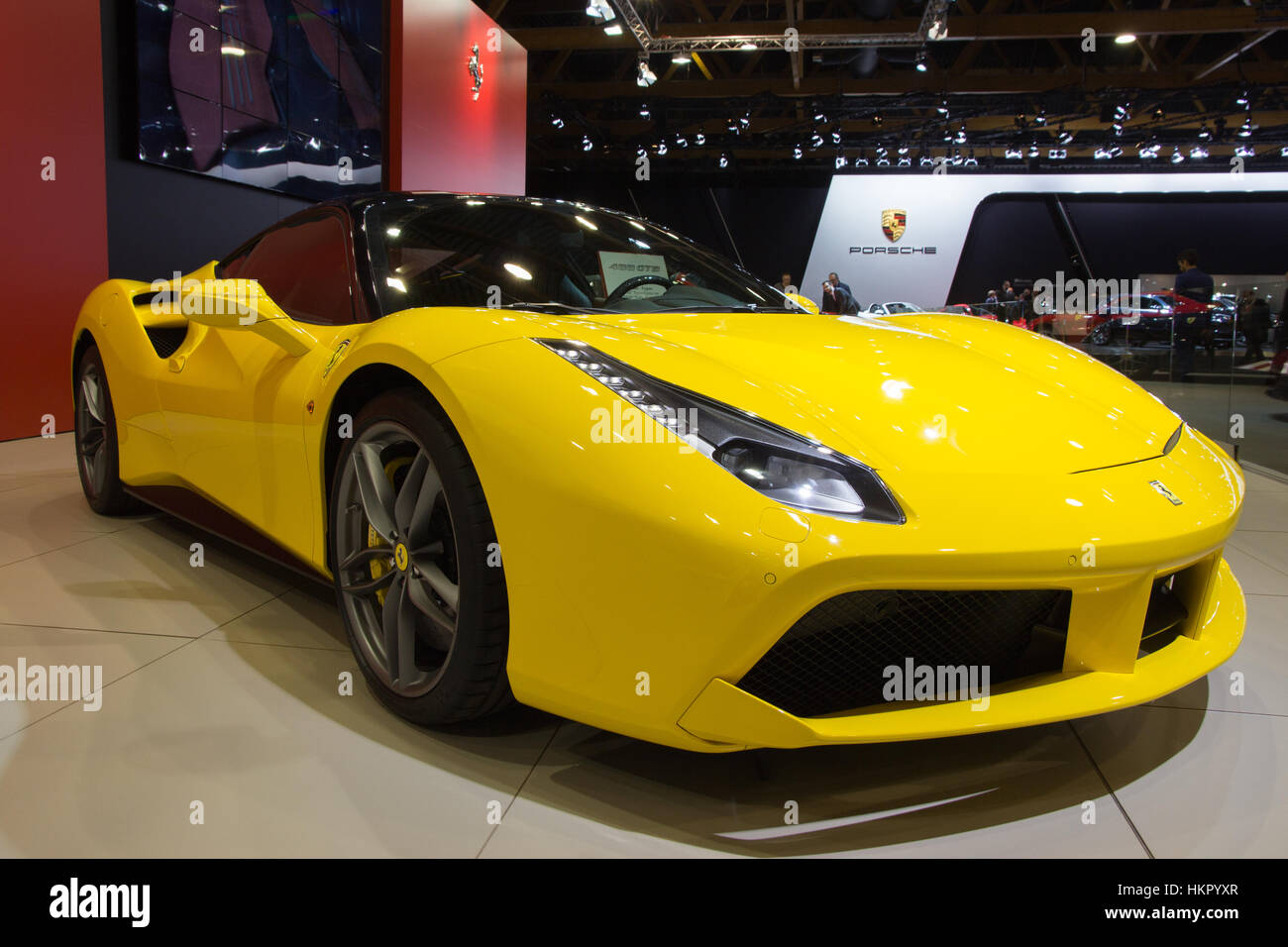 BRUSSELS - JAN 12, 2016: Yellow Ferrari 488GTB Spider sports car shown at the Brussels Motor Show. Stock Photo