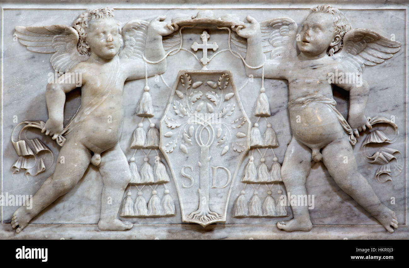 ROME, ITALY - MARCH 9, 2016: The marble relief of angels with the cardinal heraldry in church Basilica di Santa Maria del Popolo. Stock Photo