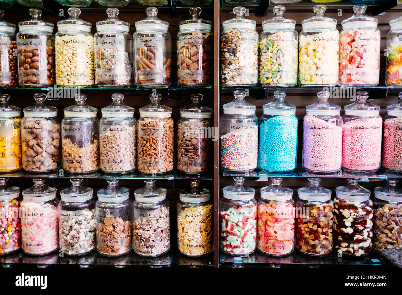 A traditional display of jars in a sweet shop in Dorset, England, UK Stock Photo