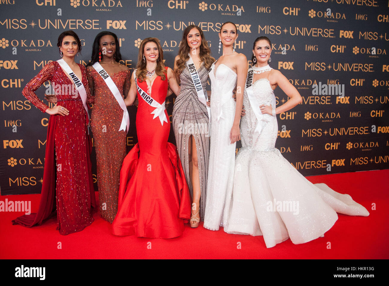 Pasay, Philippines. 29th Jan, 2017. Miss India, Miss USA, Miss Costa Rica, Miss Australia, Miss Aruba, and Miss Canada pose for a photo at the SMX in Pasay CIty. Miss Universe candidates walked the red carpet at the SMX in Pasay City a day before the coronation. Credit: J Gerard Seguia/Pacific Press/Alamy Live News Stock Photo
