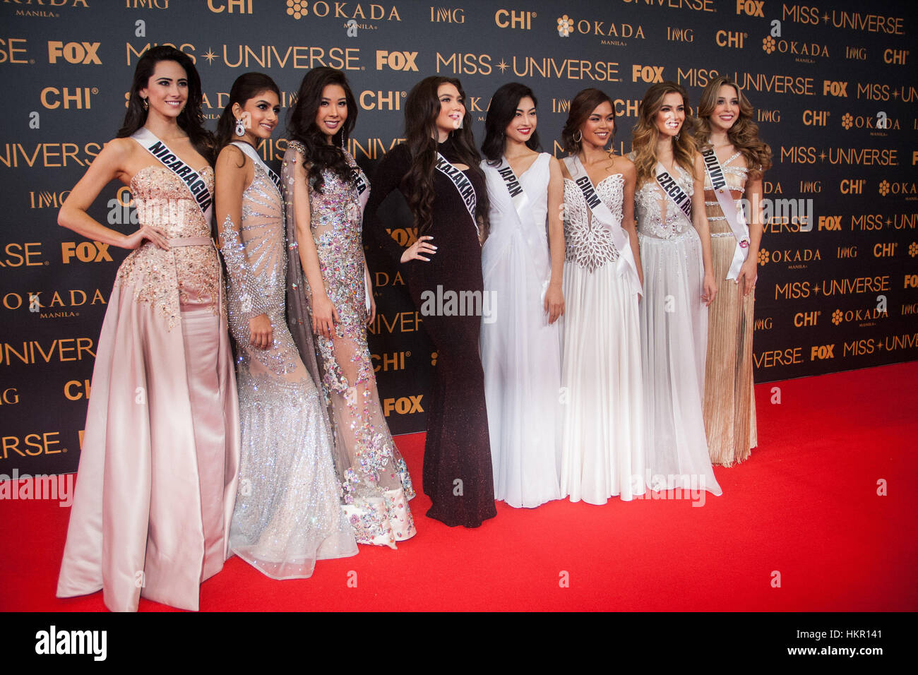 Pasay, Philippines. 29th Jan, 2017. Candidates from Nicaragua, Malaysia, Korea, Kazakhstan, Japan, Guam, Czech Republic, and Bolivia pose for pictures at the SMX in Pasay City. Miss Universe candidates walked the red carpet at the SMX in Pasay City a day before the coronation. Credit: J Gerard Seguia/Pacific Press/Alamy Live News Stock Photo