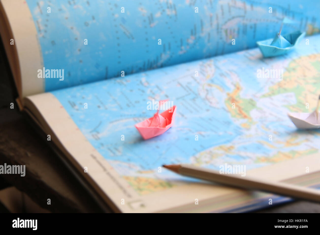 journey idea or planning vacation trip with map, blurred photo for