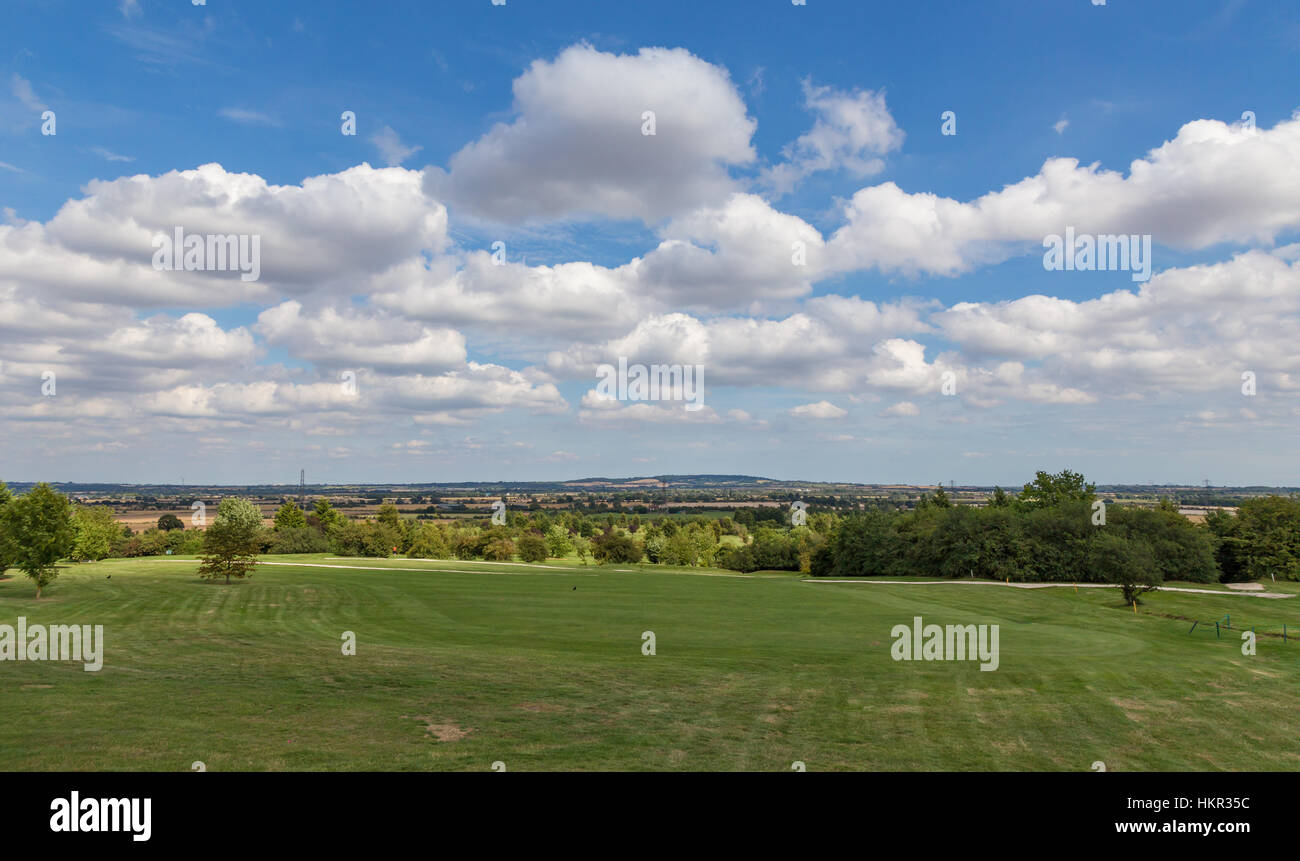 Essex countryside in Summer in late August and shows the Essex Countryside with beautiful clouds in the blue sky and nice light over the countryside. Stock Photo