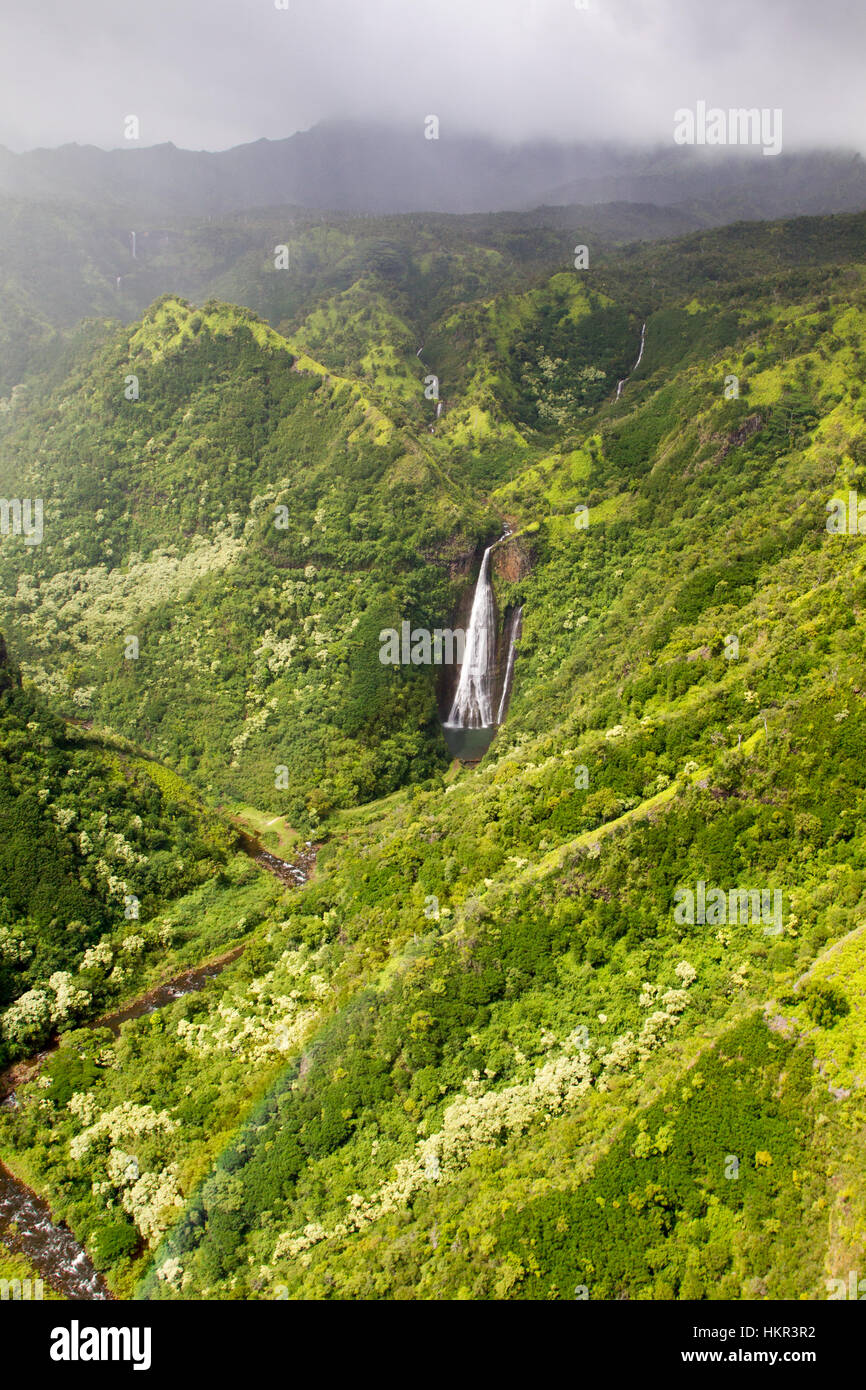 Aerial view of Manawaiopuna Falls in the moutains in Kauai, Hawaii, USA. Stock Photo