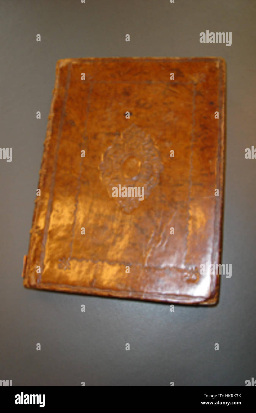 This image features the cover of a *Codex*, an ancient manuscript or ...