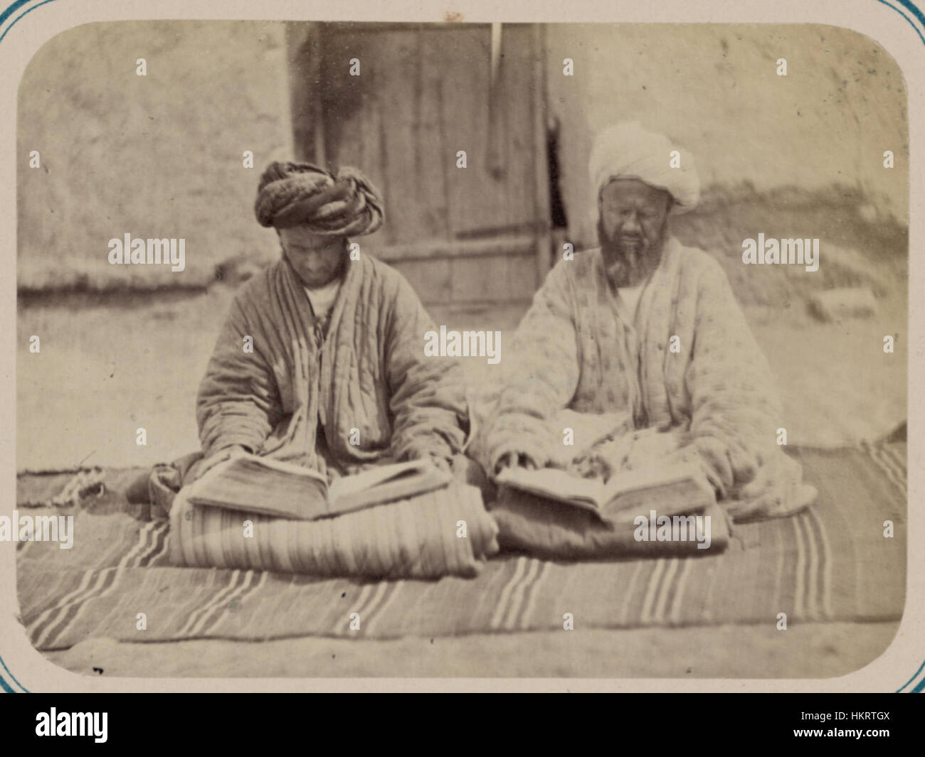 This artwork depicts Central Asians engaged in the reading of the Koran ...