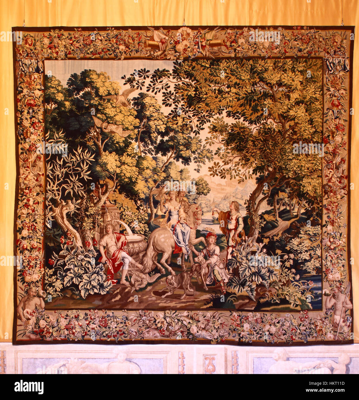 This painting, 'Diana a cavallo' (Diana on Horseback), depicts the Roman goddess Diana riding a horse, symbolizing her connection to nature and hunting. The artwork highlights classical mythology and traditional artistic representation from the Renaissance period. Stock Photo