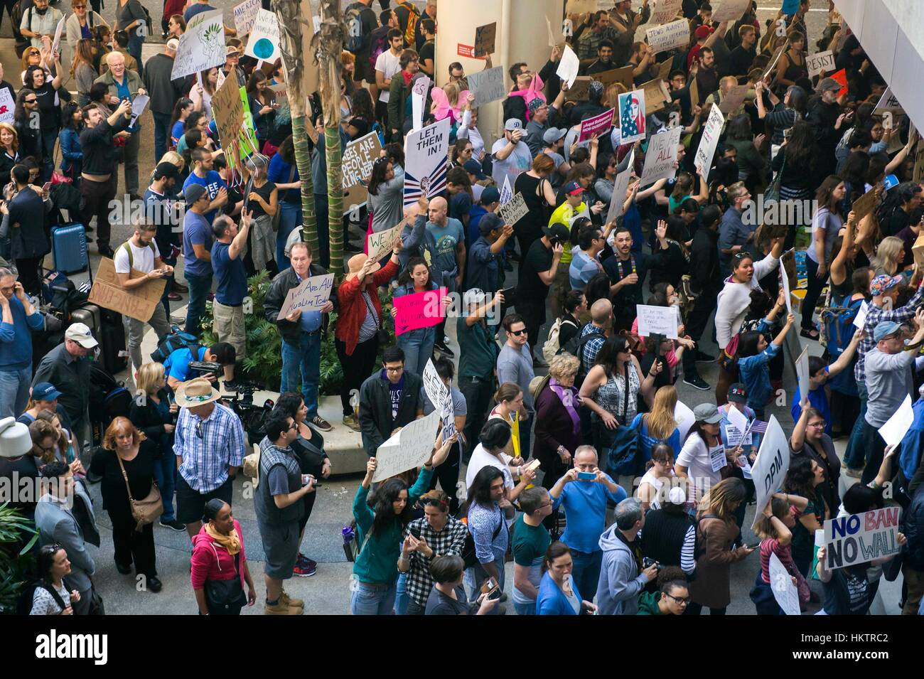 Los Angeles, USA. 29th Jan, 2017. For the second day in a row, people gather at the Tom Bradley International Terminal at Los Angeles International Airport to protest President Trump's executive order on immigration. Signed two days ago, the order barred the entry of all refugees to the United States for the next 120 days and for 90 days for citizens of seven predominantly Muslim countries. Credit: Brian Cahn/ZUMA Wire/Alamy Live News Stock Photo