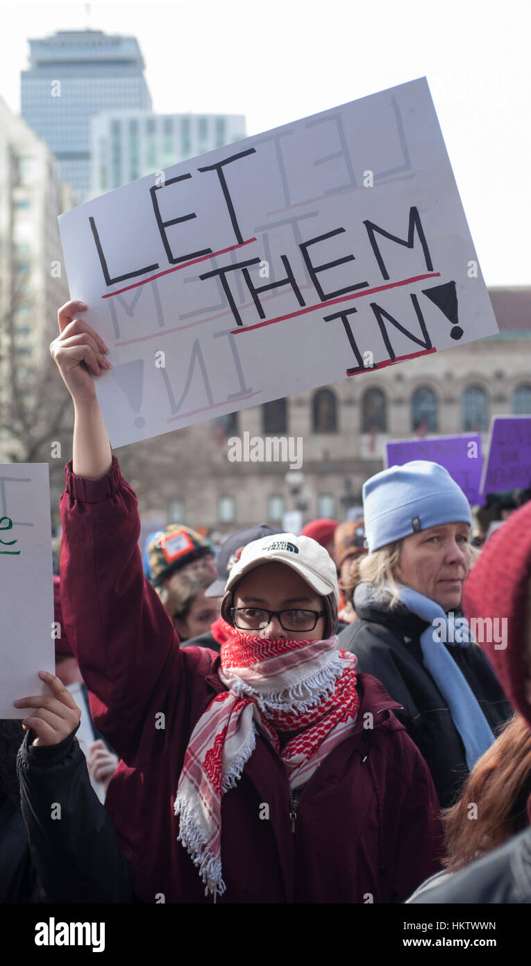 Boston, USA. 29th January, 2017.  Thousands of demonstrators filled Copley Square in central Boston protesting President Donald Trump’s executive order to stop immigration from Iran, Iraq, Yemen, Somalia, Sudan, Libya and Syria to the United States. Several thousand of the demonstrators then walked a mile through the city center to the Massachusetts State House where the chanted for the governor. Credit: Chuck Nacke/Alamy Live News Stock Photo