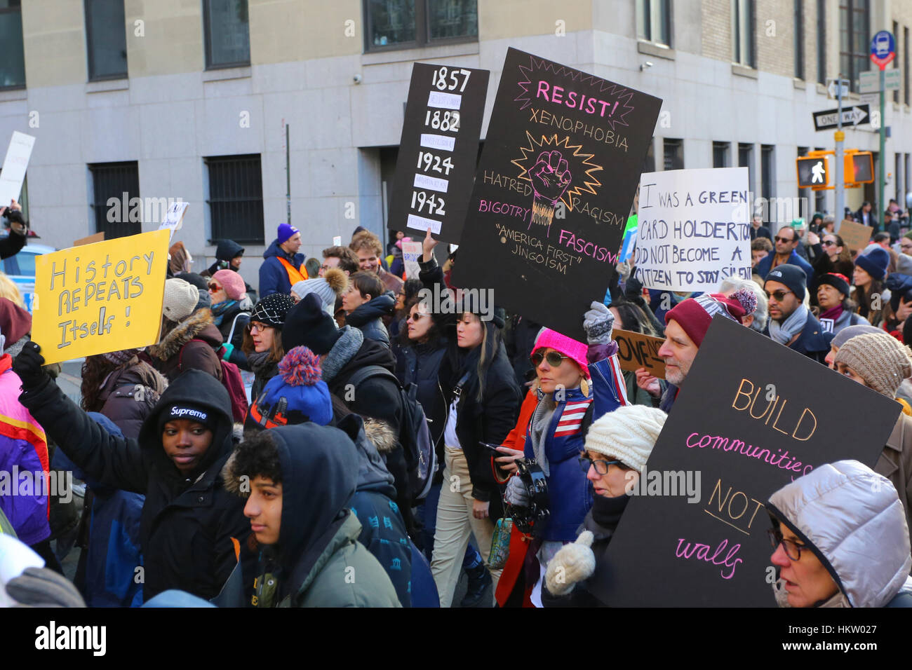 New York, USA. 29th January, 2017. People holding signs, and marching to the Jacob K. Javits Federal Building in Foley Square. January 29, 2017 Stock Photo