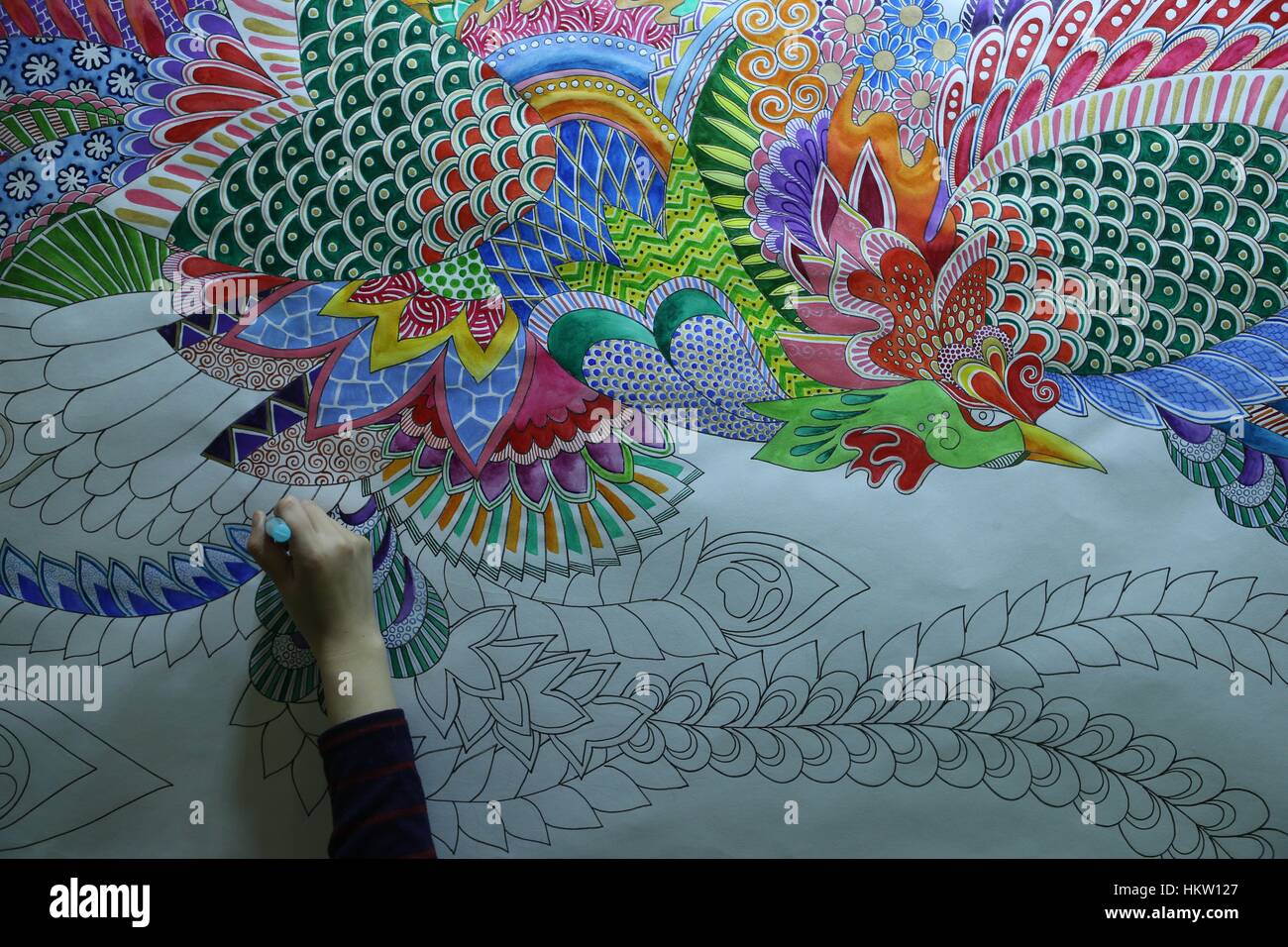 Frankfurt, Germany. 29th Jan, 2017. An artist draws during the exhibition 'Creativeworld', the world's biggest trade fair for hobby, arts & crafts and artists' requisites in Frankfurt, Germany, on Jan. 29, 2017. The Exhibition is held from Jan. 28 to Jan. 31. Credit: Luo Huanhuan/Xinhua/Alamy Live News Stock Photo