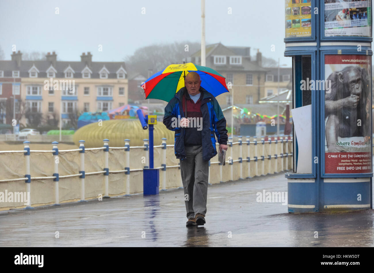 Weymouth, Dorset, UK. 30th January 2017. UK Weather. A man walking