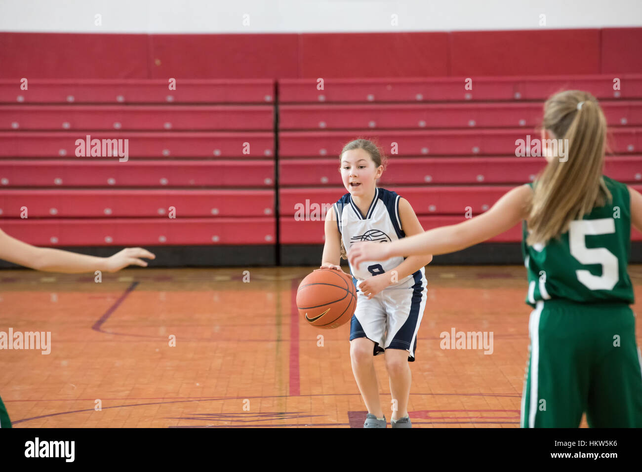 Staten Island, USA-December10,2016: Girl basketball OLHA team squares off with Team St.Patrick. Teams are sponsored by The Catholic Youth Organization of the Archdiocese of New York. Stock Photo