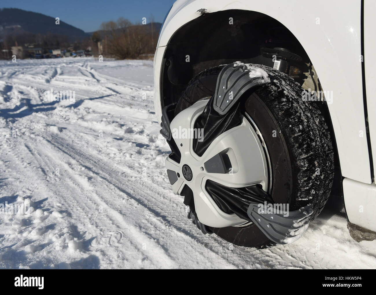 automatic snow chains system