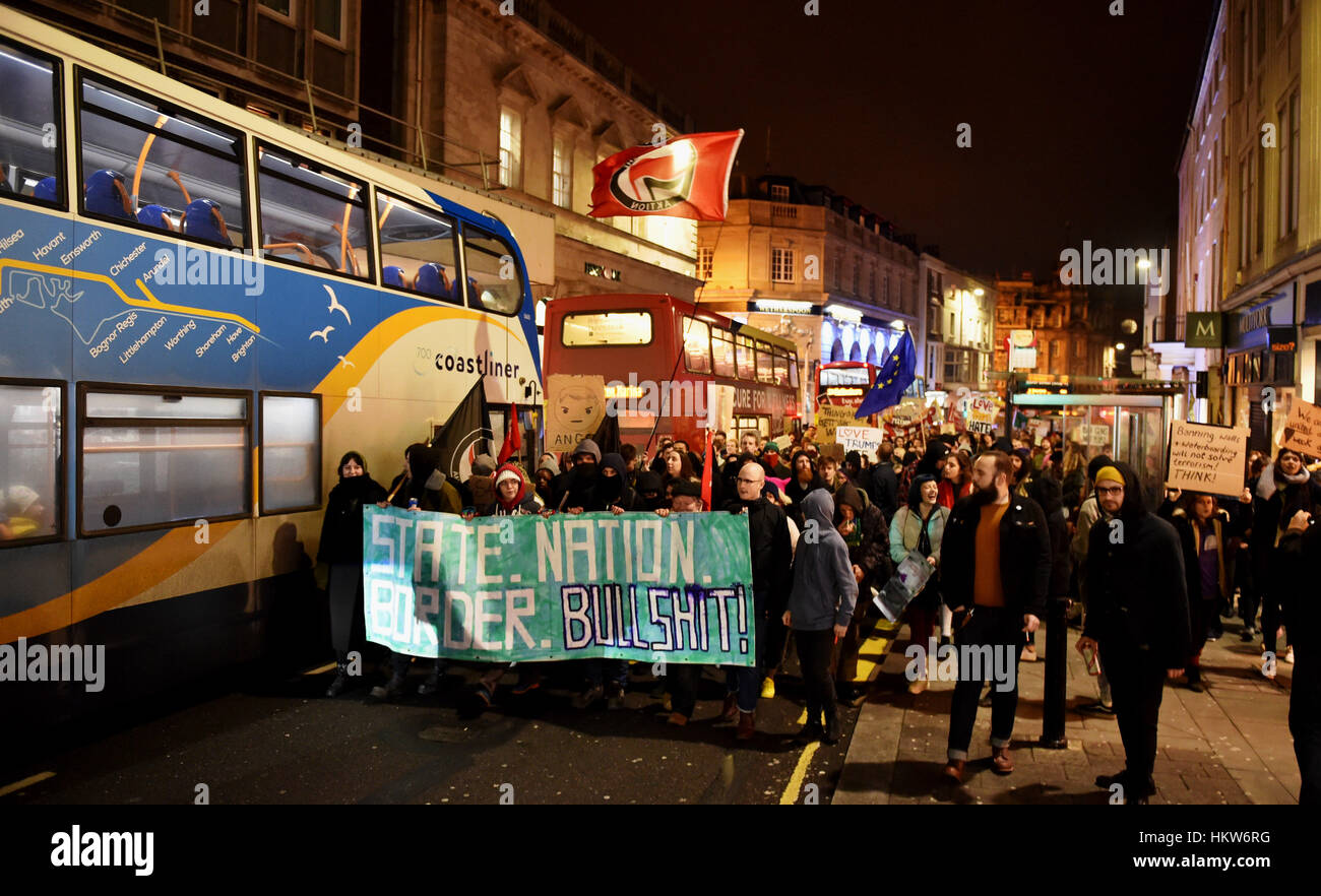 Brighton, UK. 30th Jan, 2017. Thousands of people march through Brighton as they take part in an Anti-Trump Protest tonight . The protest is against American President Donald Trump's executive order to ban people from seven mainly Muslim countries including Iraq, Iran and Somalia from entering the USA for ninety days Credit: Simon Dack/Alamy Live News Stock Photo