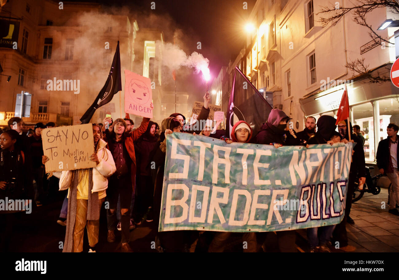 Brighton, UK. 30th January, 2017. Thousands of people take to the streets in Brighton as they take part in an Anti-Trump protest. The protest is against American President Donald Trump's executive order to ban people from seven majority Muslim countries including Iraq, Iran and Somalia from entering the USA. Credit: Simon Dack/Alamy Live News Stock Photo