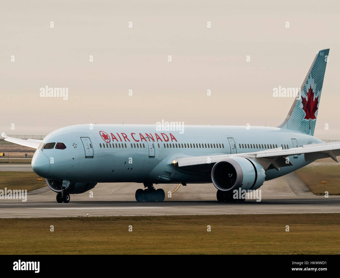 An Air Canada Boeing 787-9 Dreamliner wide-body jet airliner lands at Vancouver International Airport, Richmond, B.C., Canada Stock Photo
