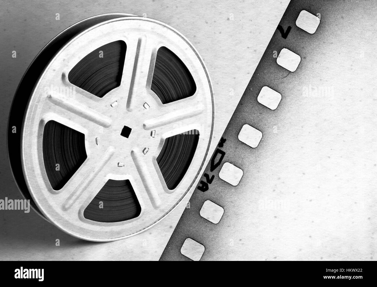 Old motion picture film reel with tape Stock Photo