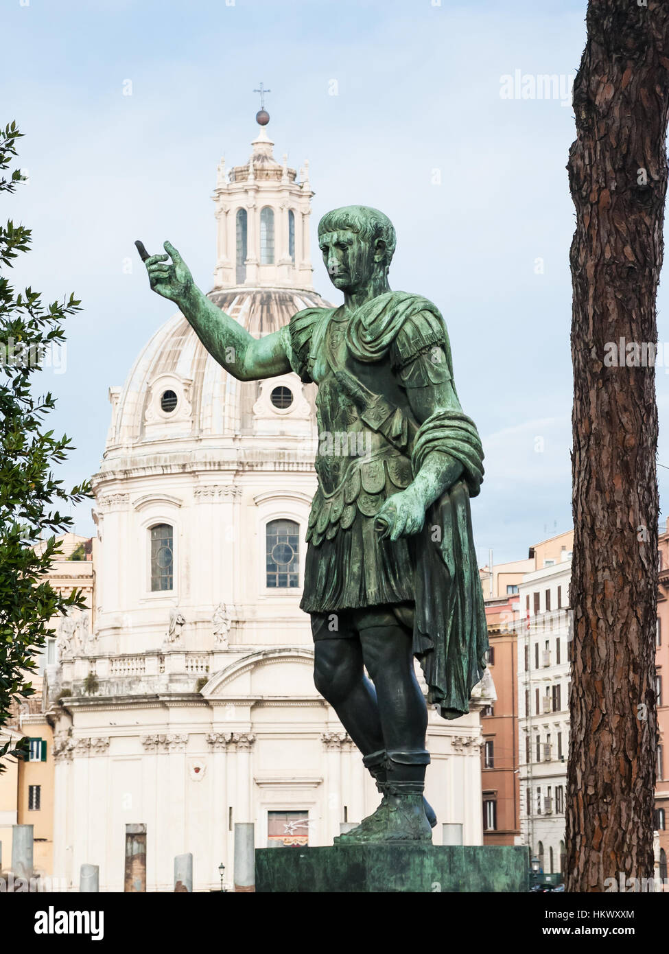Travel to Italy bronze statue of emperor on Fori Imperiali on Roman