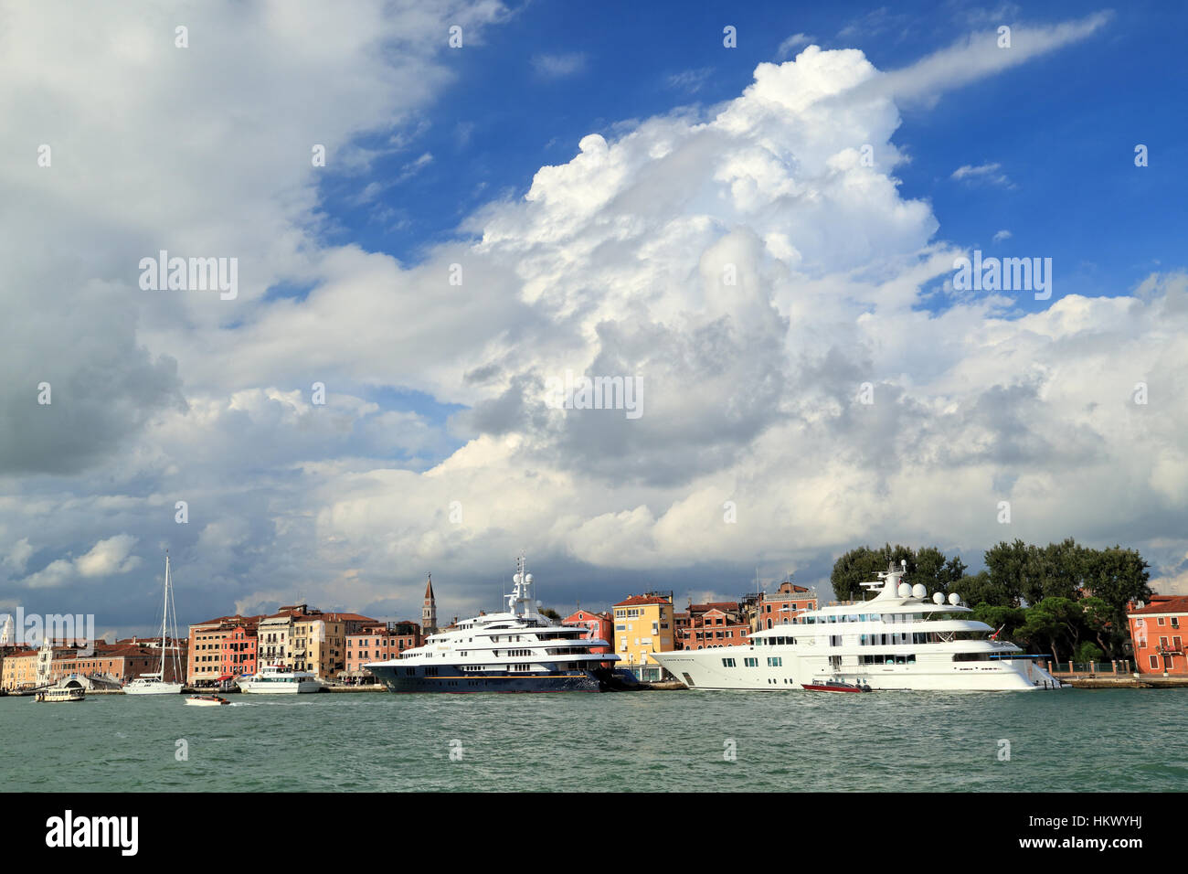 Superyachts Freedom and Lady S (IMO 8975067 and 1008217). Cumulonimbus cloud formation. Stock Photo