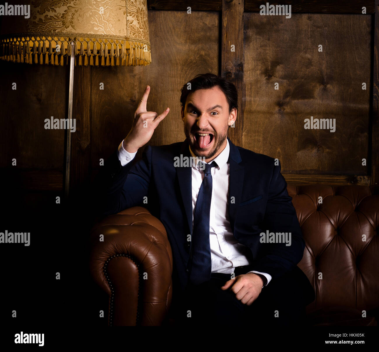 Rich businessman in office Stock Photo - Alamy