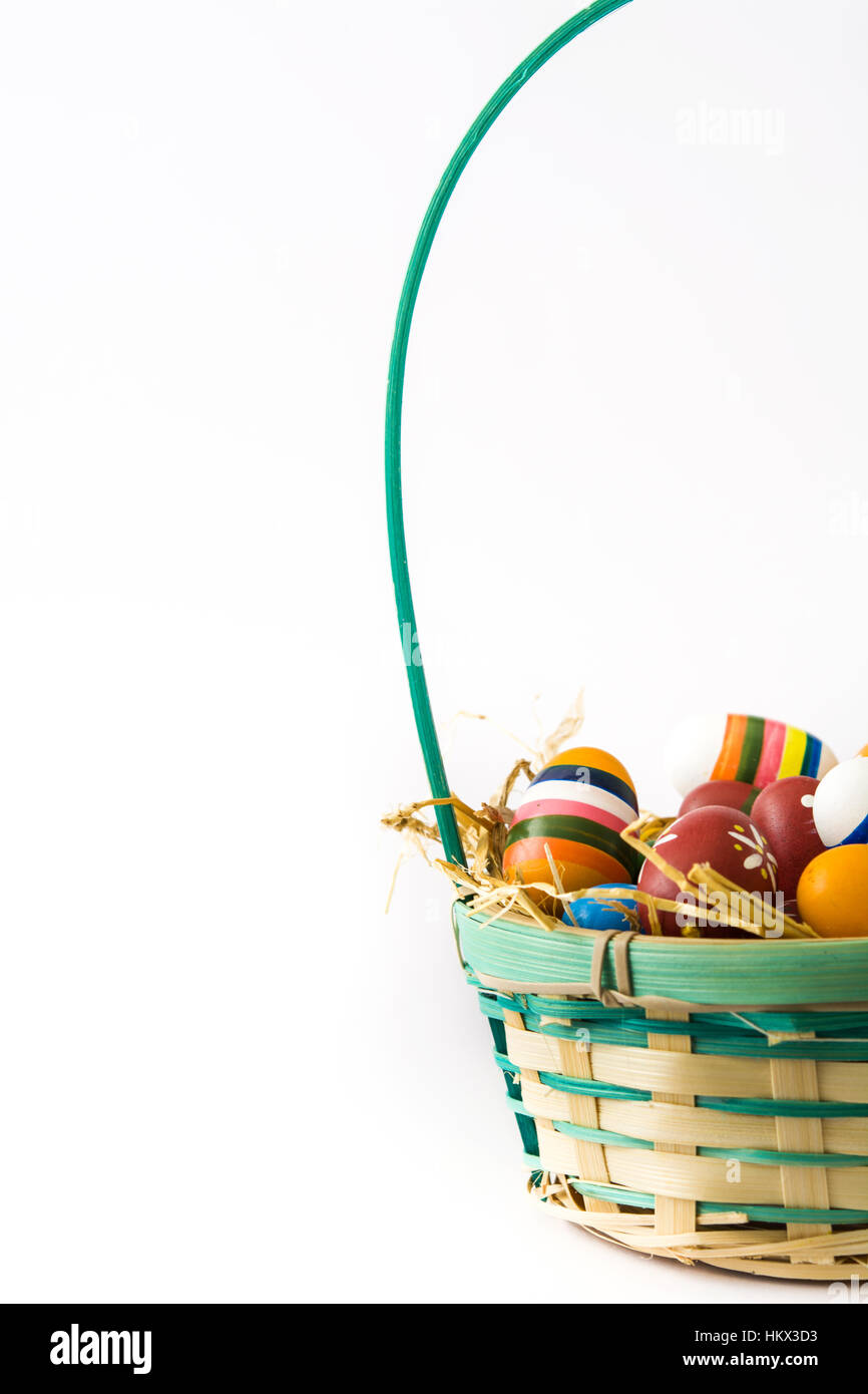 Colored easter eggs in a basket isolated on white background Stock ...