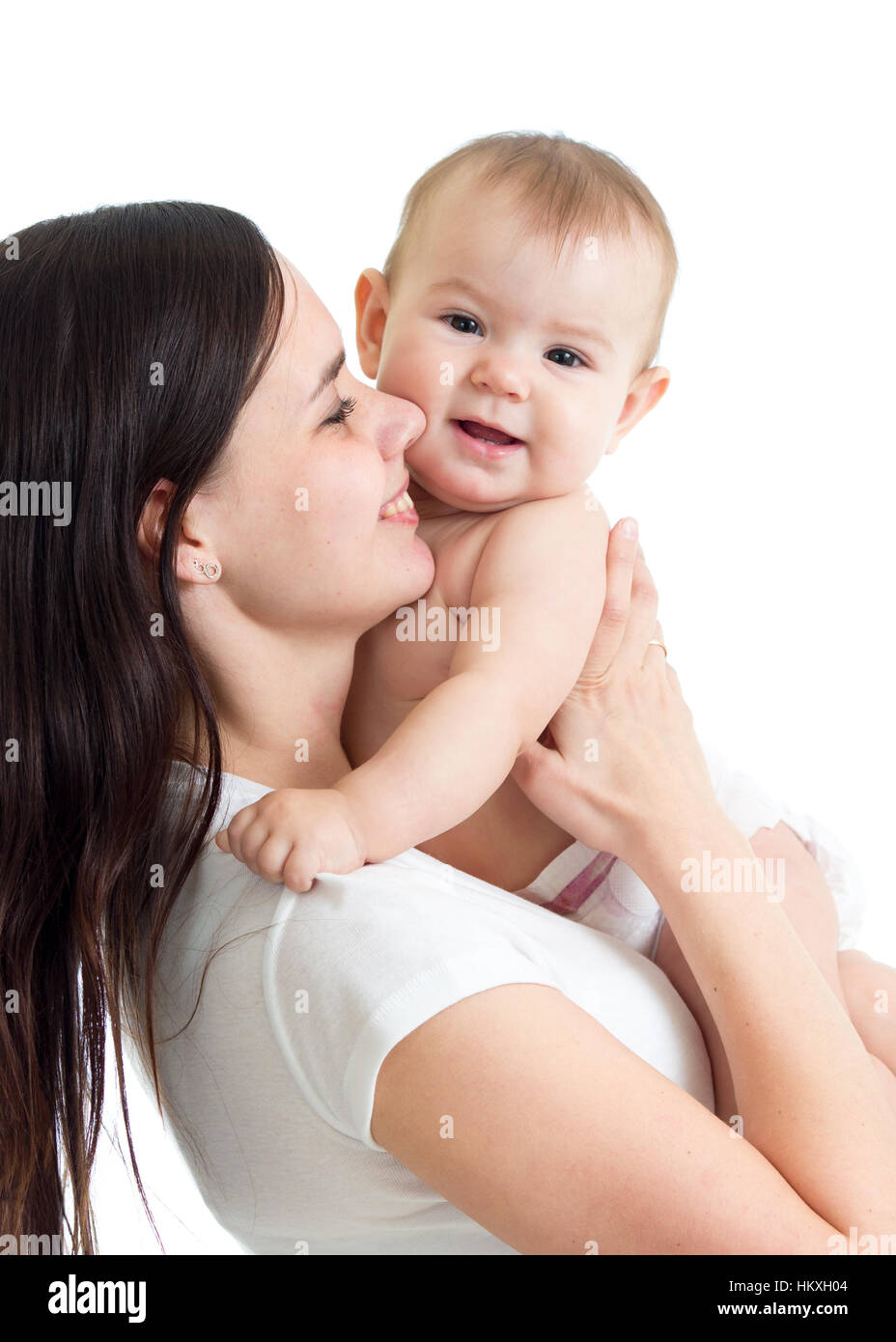 Happy family. A young mother with baby kissing and hugging. Stock Photo