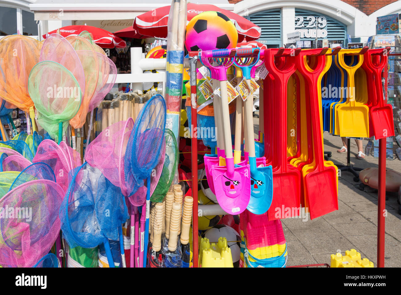 Buckets, spades and nets on souvenir stall, Kings Road Arches, Brighton