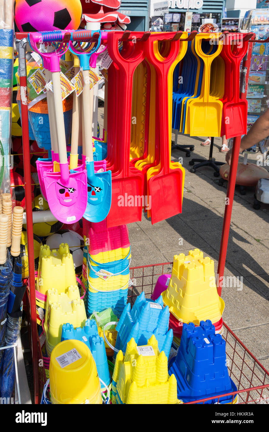 Buckets, spades and nets on souvenir stall, Kings Road Arches, Brighton, East Sussex, England