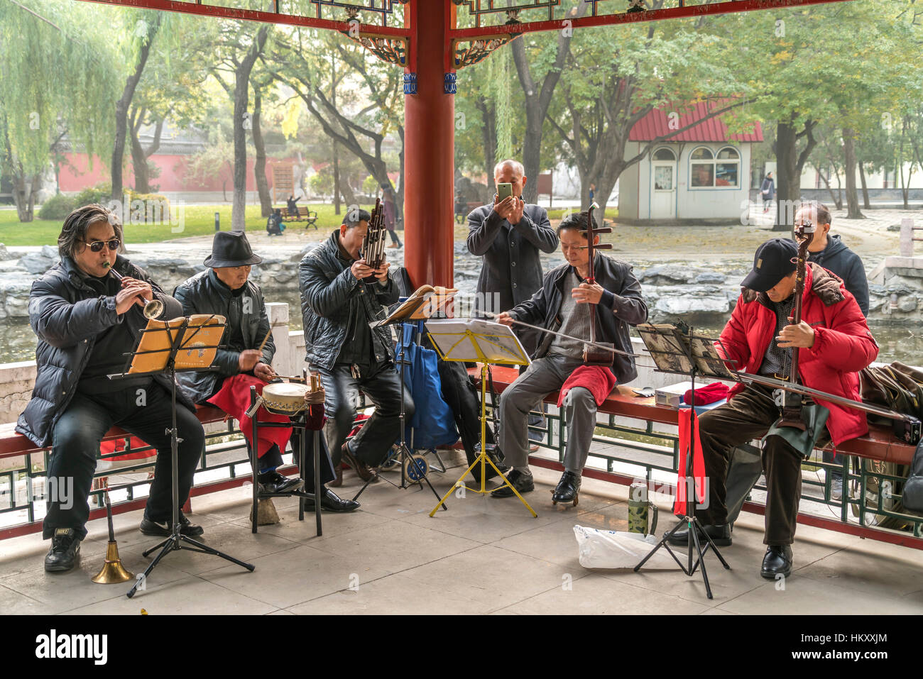 Native musicians with instruments, Ritan Park, Beijing, China Stock Photo