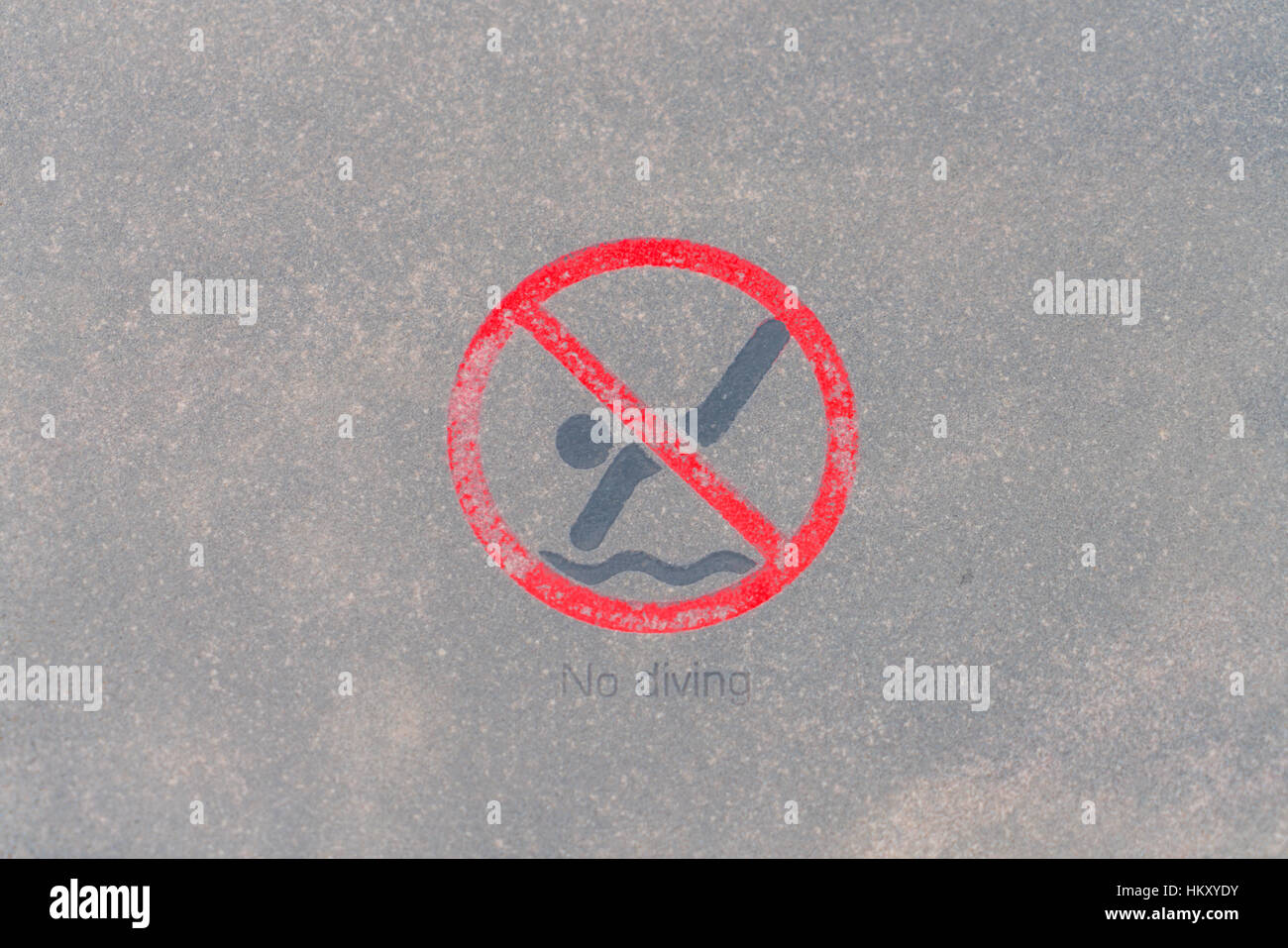 No diving warning sign at the poolside Stock Photo - Alamy