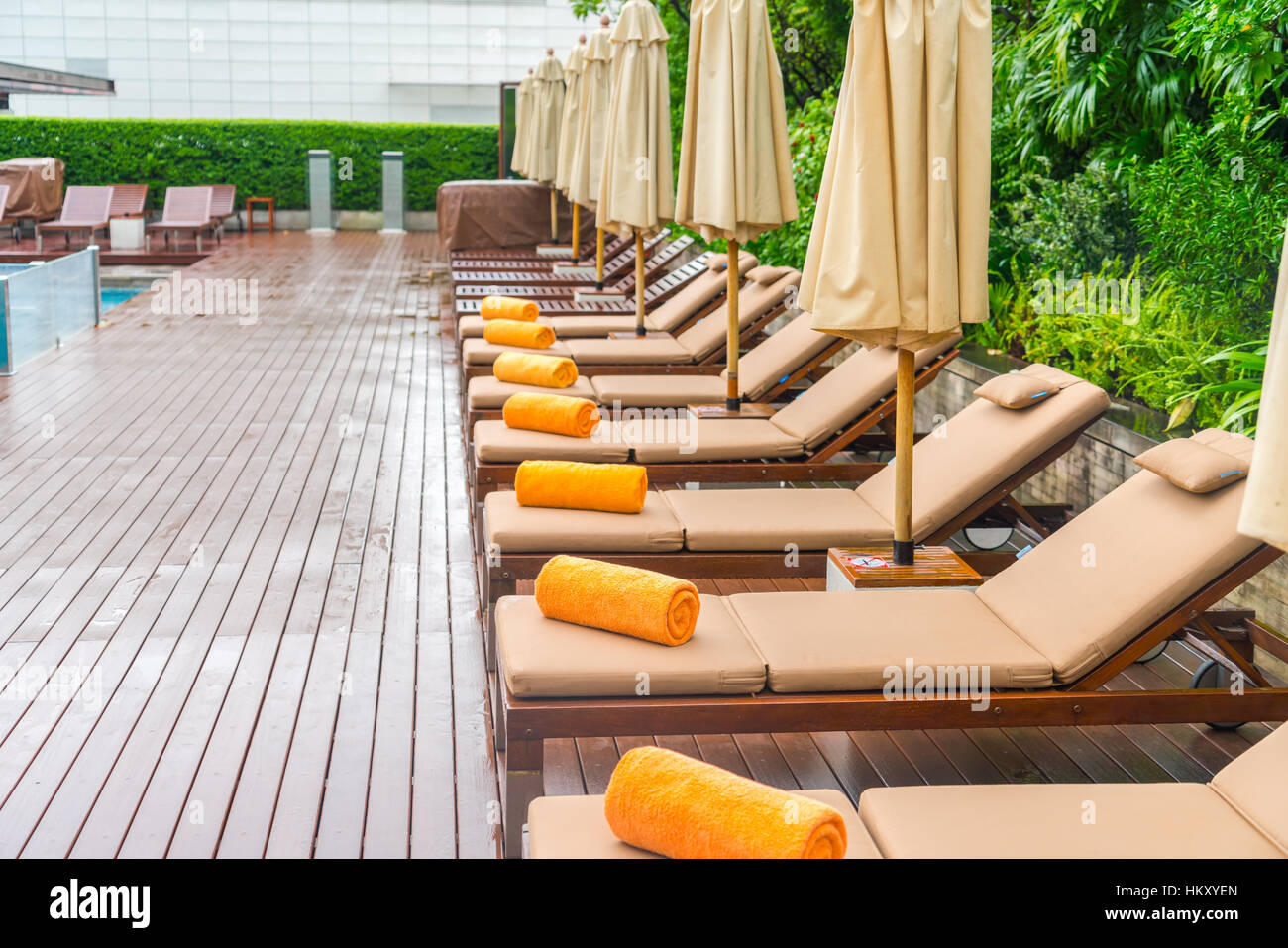 Swimming pool with relaxing seats Stock Photo Alamy